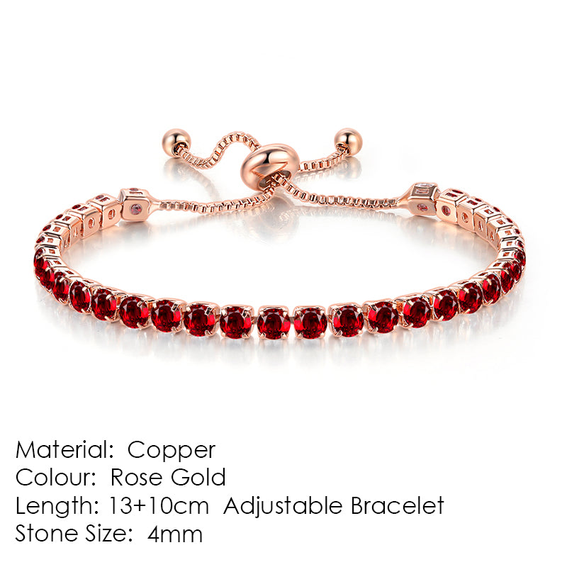 Pulseira ténis dourado rosa com zircónias vermelhas